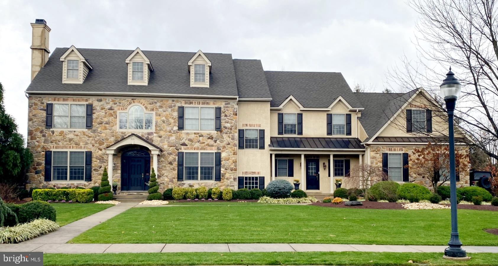 Arguably the most sought after neighborhood in Upper Dublin! Rarely does a home of this distinction come on the market. Truly move-in ready and all of your family needs have been met - finished basement, fabulous pool, sports court & amazing outdoor living! This professionally appointed and decorated home, boasts an open floor plan, hardwood flooring & light-filled rooms - all with a modern touch. Stunning new dining room with extensive moulding and stylish lighting feature, living room with a gas fireplace, a bedroom/office and powder room, two story great room with floor to ceiling windows, gas fireplace & custom millwork which opens to the kitchen. The large eat-in kitchen has ample cabinetry, separate pantry closet, spacious center island and a bright & open breakfast room. Adjacent to the kitchen is a second powder room, large mudroom/laundry room which exits to the 3 car oversized garage with finished epoxy flooring and professional storage organization. Upstairs, french doors lead to the recently redone owner's suite. The updated, large owner's bath has two separate vanities, a large double walk-in shower and water closet. This suite includes 2 walk-in closets, both completely outfitted for the discerning buyer and a private office, perfect for those working remotely. There are 3 additional bedrooms and 2 full baths on this floor. The attic is enormous and floored for storage and ready to be finished if the additional space is needed. The lower level is fully finished for entertaining and keeping the kids busy...lounge area with wet bar, built-ins and fridge, separate room for ping-pong & "hanging" out, gym and a half bath. To top it off, the outside living space is spectacular! Large patio with built-in kitchen and ample space to entertain. Separate dining area as well as an amazing lounge space surrounding the fireplace and tv. Heated pool, hot tub and porous pave sports court complete this outdoor oasis! Don't miss your opportunity to see this amazing home! Located in a wonderful neighborhood in award-winning Upper Dublin School District. Close to shopping, places of worship, walking distance to elementary school and Mondauk Park. Easy access to Turnpike, 309 and Blue Route. Additional photos will be uploaded later this week. Showings begin Saturday, February 13th.