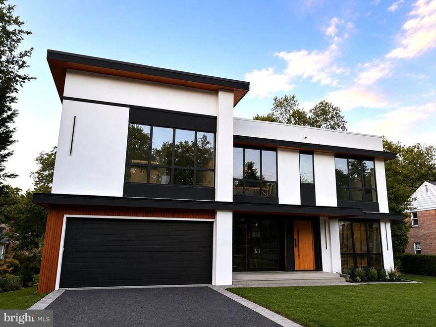 This stunning custom-built residence offers over 8,000 square feet of meticulously designed living space, seamlessly blending luxury, functionality, and modern elegance—just minutes from Washington, D.C.
The thoughtfully crafted layout includes a main-level guest suite, four spacious en-suite bedrooms on the upper level, and a private lower-level suite—ideal for multi-generational living or hosting long-term guests.
Step into a chef’s dream kitchen featuring sleek Italian custom cabinetry, a striking oversized porcelain island, premium Thermador appliances, and a fully equipped spice kitchen with GE Profile appliances. Complementing the space are a butler’s pantry, breakfast nook, formal and informal powder rooms, dog wash station, and a well-appointed mudroom. A floating metal staircase with glass rails adds architectural drama, while the attached 2-car garage connects seamlessly to the interior.
The luxurious primary suite is a sanctuary, complete with a cozy fireplace, private balcony, wine bar, dual walk-in closets, and a spa-inspired bathroom with soaking tub and bespoke vanities. An additional family loft and a large laundry room add comfort and convenience.
The fully finished basement is an entertainer’s paradise featuring a spacious rec room with fireplace, a designer wet bar with Calacatta marble quartz countertops, a glass-enclosed fitness room, Zen spa with a dry sauna, and an additional guest suite.
Additional features include dual-zone high-efficiency HVAC systems, smart thermostats, and designer finishes throughout.
Don’t Miss This Rare Opportunity
Be among the first to experience this exceptional new construction home in the heart of McLean. Message us today for early access. Photos are for reference only, will upload actual photos soon.