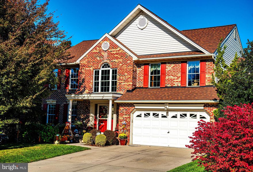 Welcome to this beautiful colonial-style single-family home located in the sought-after Amyclae East neighborhood of Bel Air! Featuring a charming brick and vinyl siding façade, this home offers great curb appeal with a covered front porch, elegant trim detailing around the storm door and front entry with sidelights, a two-car garage, large concrete driveway, and beautiful landscaping, completing the inviting exterior. 
Inside, you’ll find 4 bedrooms, 2 full baths, and 2 half baths, along with a two-story foyer featuring hardwood floors and an adjacent half bath. The formal dining room includes a lovely bump-out and new carpet, while the living room showcases a large bay window and new carpet as well. The eat-in kitchen offers a large island with seating, oak cabinetry, gas cooking, two pantries, laminate flooring, and a sliding glass door that opens to a spacious deck—perfect for entertaining.
Off the kitchen, the laundry room has been refreshed with paint, a new washer, and laminate flooring, and the step-down family room features a cozy gas fireplace with a stone surround and laminate floors. Upstairs, the primary suite presents vaulted ceilings, new luxury vinyl flooring, walk-in and linen closets, and a private bath with dual vanities, tile flooring, a tiled shower, and a soaking tub. The hall full bath offers dual pedestal sinks and a tiled tub/shower combo. Both full baths have recently been refreshed, and three additional bedrooms complete the upper level—two with new carpet and one with new LVP flooring.
The finished lower level provides a spacious finished recreation area, a half bath, and walkout access to the backyard. Outdoor living is easy with a large stamped concrete patio, an inground pool with a concrete pool deck, and a new split-rail fence surrounding the pool area,  ideal for relaxing or entertaining.
Recent updates include new light fixtures, an added pantry, an upgraded kitchen island, a dishwasher (2025), and a refreshed laundry room with new light fixtures, flooring, and paint, plus a new washing machine (2024). The full baths were refreshed in 2024 and 2025, the primary bedroom and one additional bedroom received new laminate flooring in 2025, and new carpet was installed in the living and dining rooms, two bedrooms, the staircase, and the upper-level foyer in 2025. Additional updates include pool fencing (2025) and a roof replacement (2021).
This home has been lovingly maintained and thoughtfully updated—ready for you to move right in and enjoy!