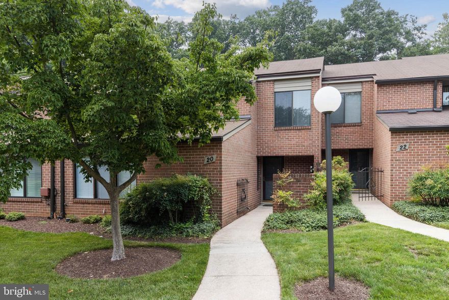 Rare opportunity to own a meticulously maintained home in the sought after, gated community of Oakhampton. The spacious, open floor plan with generously sized living and dining areas, make this home perfect for entertaining. Enter into the large foyer with a half bath. Hardwood floors flow throughout the home...Continue into the dining room or into the living room featuring a marble wood burning fireplace. The sliding glass doors lead to a private patio which opens to beautiful green space and trees. The secure storage shed is equipped with electric, making it suitable for many uses. The remodeled eat-in kitchen features a laundry area and a large pantry. Upstairs you will find the primary bedroom,  renovated en suite bath with double sinks, and a large walk-in closet. Two other bedrooms and a full bath complete this level. Enjoy popular community amenities including an outdoor pool, tennis and pickleball courts.