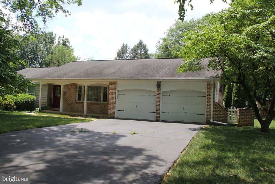 Beautifully maintained classic Bloomingdale one-story brick & viny rancher in Manheim Township located on .4 Acres of level spacious back and front yards with mature landscaping in a quiet and charming neighborhood! This home provides three bedrooms and two full baths, hardwood floors, kitchen opens to breakfast area and  cozy family room with a working fireplace.  This home feature original hard wood floors under the wall to wall carpets along with plaster walls. Off the breakfast area is a private patio with awning  and carpet for those extra sunny days. All windows except large living room window were replace in 2006. The original siding was replace with vinyl insulated siding in 2008. Roof was replaced by Sunrise Roofing in 2004. Gas hot air heating system and air conditioning were installed by Ressler & Mateer with optional yearly maintenance contracts every year since installation. Full Radon Mitigation System included. Don't miss this solid classic beauty in a prime location.