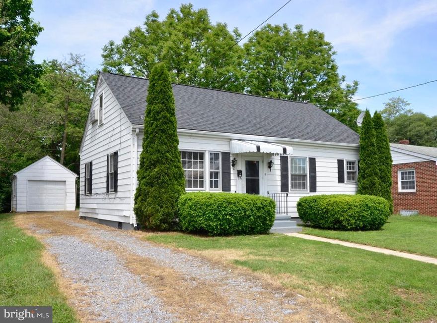 Charming cape cod in quaint downtown Berryville.  2Br 1.5 Baths. High ceilings laminate hardwood floors through out main level. Finished second level with large bedroom or space with many options. Large backyard  with mature trees.Detached garage with storage and work bench. Must see!!      *Sellers and agent are related.