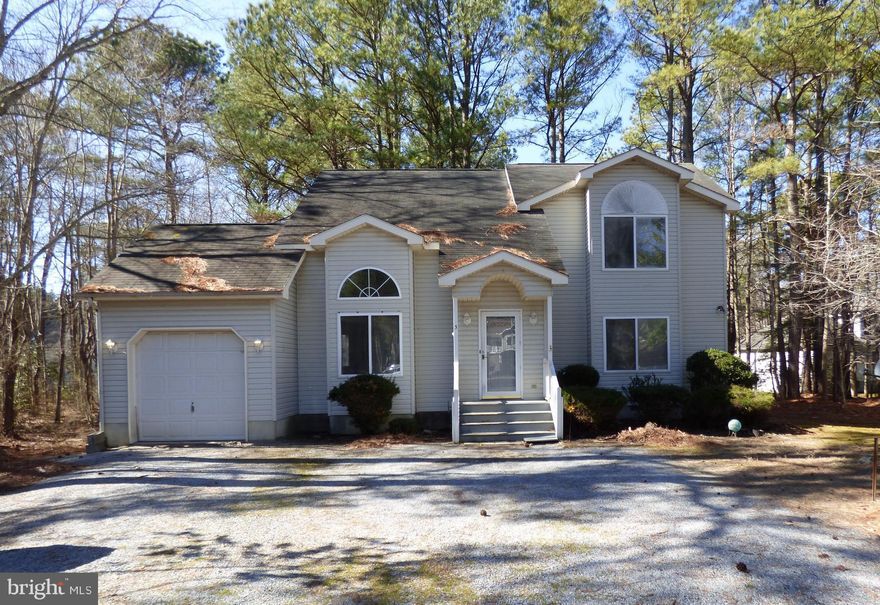 Lots of space in this 4 bedroom home located on an oversized lot at the end of a small cul-de-sac street in Award-Winning Ocean Pines!  Sold in As-Is condition, but all it needs is a little love to make it shine again! The hardwood entry leads to the soaring 2-story great room, dining room and kitchen.  Enter the 14x10 screened porch and ground level deck through sliding glass doors.  Rounding out the main level is a 17x14 Primary Bedroom with walk-in closet.  The upper level contains 3 more bedrooms plus a full bath and pull-down attic stairs.  Located close to both the water and the golf course.  Don't miss your chance to obtain plenty of house for an affordable price!