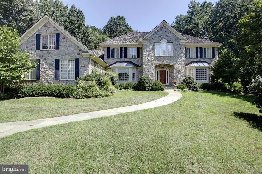 Out of State Owners want this SOLD. Unbelievable price for this SF, location and condition! Handsome, 7,000+ SF stone colo w/ private, 3 ac setting bkg to parkland. Quiet, attractive 5 home enclave. open & airy feel, 10' ceilings, generously proportioned rm sizes. 2 story foyer, newly updated kitchen w/top of the line stainless steel appliances, carrara marble counters. Excellent locationChurchill