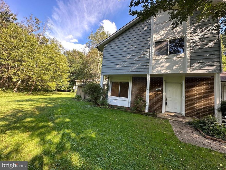 Exceptional end-unit townhouse offering unparalleled privacy and nature views from its backyard, which abuts beautiful mature trees. Meticulously and fully renovated in Fall 2024, all full bathrooms, the powder room, premium Luxury Vinyl Tile (LVT) flooring, newer carpet, and a completely updated kitchen featuring brand-new quartz countertops and stainless steel appliances. Includes a fenced yard perfect for entertaining.