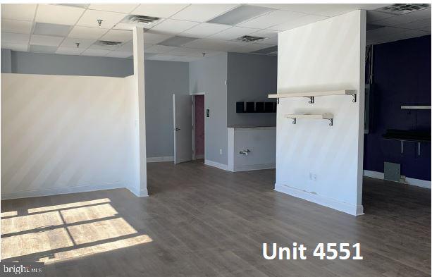 JACKSON SQUARE BUSINESS - Commercial Lease