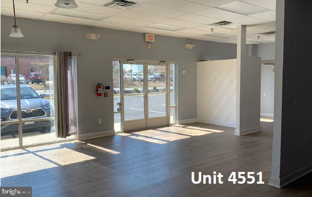 JACKSON SQUARE BUSINESS - Commercial Lease
