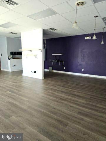 JACKSON SQUARE BUSINESS - Commercial Lease