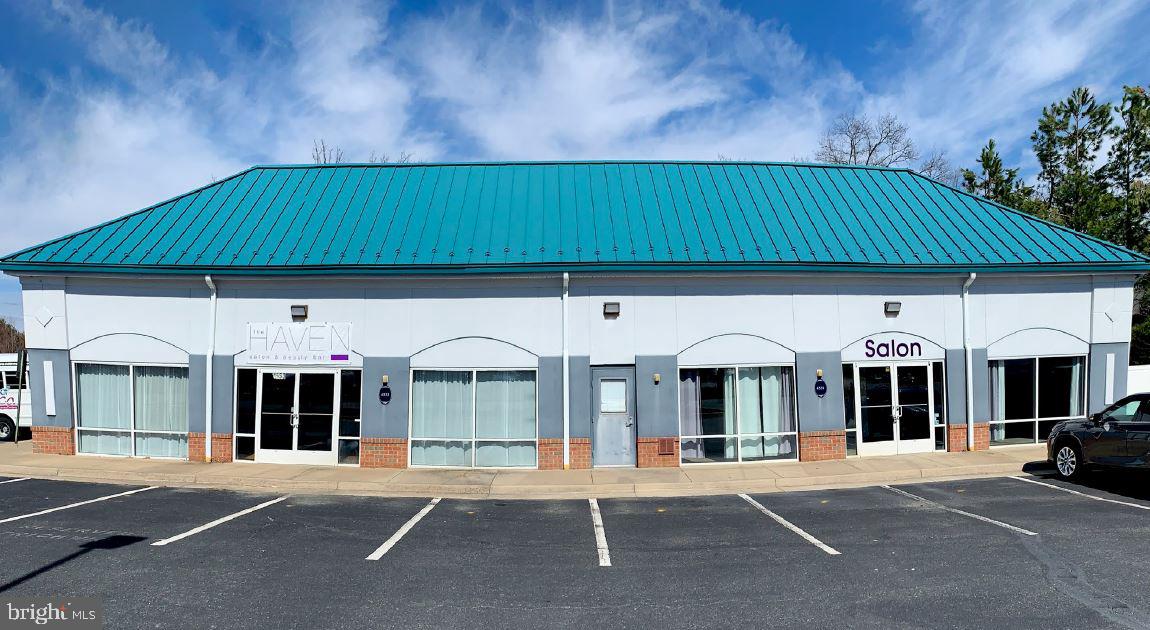JACKSON SQUARE BUSINESS - Commercial Lease