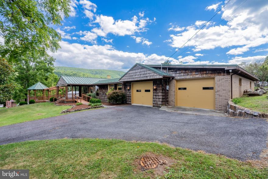 Beautiful Cedar Shake Home on a Double Lot – Franklin, WV

Perched on a spacious double lot in the heart of Franklin, WV, this stunning cedar shake-sided home offers the perfect blend of rustic charm and modern comfort.

🛏 2–3 Bedrooms
🛁 1 Full Bath + 1 Half Bath (Basement)
🚗 Expansive Garage/Workshop Space

Step inside and fall in love with the warm, inviting character of this gorgeous home. Whether you're looking for a peaceful retreat or a home with plenty of room for hobbies and projects, this one has it all.

🏡 Home Highlights:

Recently painted and sealed basement – ready to be finished to suit your needs

Large covered front porch connecting to a gazebo – the perfect spot to enjoy quiet country evenings

Screened-in porch and flagstone patio in the rear – ideal for outdoor relaxation and entertaining

Beautiful, mature landscaping adds curb appeal and charm

From the rustic exterior to the thoughtfully designed outdoor spaces, every detail of this home has been carefully maintained and loved. It’s move-in ready and waiting for its next chapter — could it be yours?

📞 Call us today to schedule your private showing!