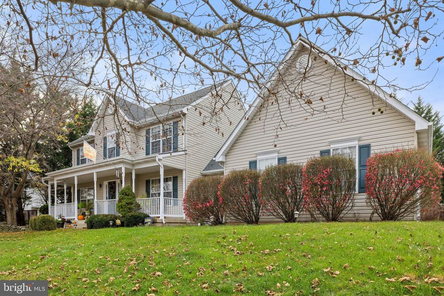 Updated 4 bedroom 3.5 bath Colonial on almost 1/2 acre in sought after small enclave of homes in Round Hill Virginia with NO HOA.  Renovated kitchen with 42 inch cabinets, gleaming quartz counter tops, center island, new flooring and nice eat -in area. Family room with gas fireplace and hardwood floors. Foyer, Separate dining room  and Living room.  Large mud room with access to 2 car garage, and laundry room.
Lower level has great rec room, cute wet bar and unique wine area plus  a full bath and plenty of storage
This home sits on almost 1/2 acre of level lawn with plenty of room to spread out and enjoy the outdoors. Large almost ground level deck affords easy access to the inside and the yard.  Recent updates include Roof, HVAC, Washer, Select Hardwood Flooring, Washer, Sink, Disposal, Range and more.  This one has great location, large lot, NO HOA, and many updates with convenience of paved publicly maintained streets in quiet county setting.