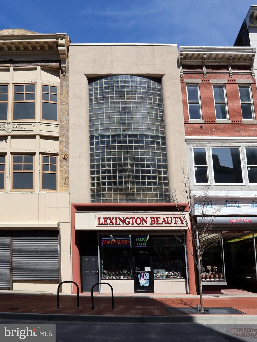 PRICE DROP!!!  Coldwell Banker Commercial NRT is pleased to announce the exclusive listing of
112 West Lexington Street, Baltimore, Maryland 21201 for sale. This Storefront/Retail asset's first floor is 1,705 SF of retail space currently used as a beauty supply store. The second floor is a 1500 SF
 2 BR , 2 Bath apartment.  Property is near the corner of Park Avenue and West Lexington Street and boasts a classic glass block front facade.  Just blocks from the newly renovated World Famous Lexington Market and CFG Bank Arena (formerly Royal Farms Arena).