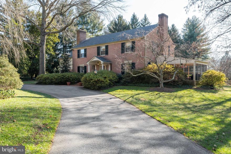 Located in one of Baltimore’s most desirable neighborhoods, this stunning 4 bedroom/4.5 bath home is perfectly situated on a private, quiet lane in the heart of Ruxton. This spacious colonial sits on a gorgeous, professionally landscaped double lot (2.67 acres) and boasts an expansive, fully-usable, fenced-in back yard, circle drive and impeccably maintained swimming pool. Enjoy this peaceful setting from the brick terrace, awning-covered patio, or screened-in porch with plenty of space for dining and lounging. Enter this home from a welcoming center foyer flanked by a large, bright living room with hardwood floors and wood-burning fireplace, and a sizeable secondary living room with gas fireplace and built-in bookcases that is perfect as a den or office. Host your large gatherings in the formal dining room with hardwood floors and French doors leading to the gorgeous outdoor porch. The sun-filled, open-concept kitchen has adjoining breakfast and family rooms with vaulted ceilings, gas fireplace, and multiple glass doors that open to the patio and pool areas, offering seamless entertaining. Laundry is conveniently located off the kitchen on the way to the oversize 2-car garage with storage area. Ideal for family living, the upper level includes 4 bedrooms and 3 full baths. Retreat to the airy, spacious primary bedroom with walk-in closet and beautiful ensuite bath with two vanities, jetted tub and separate shower. 2nd bedroom has its own hall bath, and 3rd and 4th bedrooms share a bath. The lower level is fully finished with ample space for recreation, playroom, game room, or exercise room. Other amenities include a large office with walk-in closet and full 3-piece bathroom. Lower level also allows for plentiful storage, workbench and additional laundry.