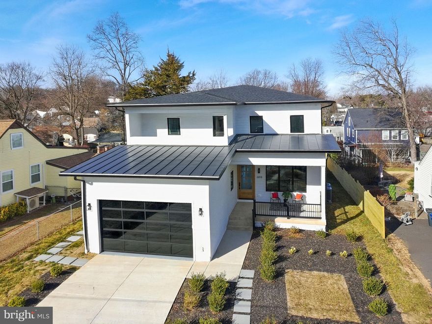 Fabulous New Construction (ready for occupancy this April 2026) in the Heart of West Falls Church!
This outstanding custom home offers modern luxury with a welcoming open floor plan, featuring three finished levels with soaring high ceilings, an owner's wing with private balcony, a gourmet kitchen with custom cabinetry, waterfall quartz island, and top of the line appliances on a beautiful private fenced lot in the sought after Bel Air/Westlawn neighborhood.
Welcome friends and family from the oversized covered porch through the custom fitted hardwood front door into the gracious foyer, with coffered ceilings, a double coat closet with auto lighting and stunning wide plank white oak floors.  To the left is the main level bedroom with a luxury full bathroom with walk in shower - perfect to pamper your guests!  The hallway expands into the main entertaining area, with an elegant light-filled dining room that leads to the butler's pantry with a generous serving counter with sink, second dishwasher, and impressive walk-in larder pantry, ideal for housing all your entertainment finery.  Entering the chef's kitchen from the Butler's Pantry you will see the most impressive MC3 Design custom designed high end gourmet space, with level 8 Quartz countertops, backsplash, and a spacious waterfall island with seating.   Stunning white custom soft close cabinetry extends to the coffered and suspended ceilings.  The layers of lighting, including under cabinet and pendant lighting, add to the ambiance.  The suite of Thermadore Masterpiece Collection appliances will be the envy of all.  The kitchen features Wi-Fi enabled double ovens, a 6-burner gas cooktop and a beverage cooler.  
 The view from the kitchen expands to the breakfast area and great room with hardwood flooring continuing throughout the main level.  The main level entertaining space opens to private fenced backyard with an expansive oak deck ideal for dining out under the stars.  The deck staircase leads to the landscaped yard with paver pathway throughout the treed framed fenced yard.
Cascading LED sequential staircase illuminates with each step leading to the upper floor.  This level features 4 bedrooms, with hardwood flooring each with attached bathroom, and a convenient separate laundry room.  The outstanding owner's wing offers the ultimate retreat with private balcony access, a sitting area, luxury spa bathroom, with rain shower and free-standing soaking tub with double vanities. The walk-in closet with room for and island offers custom built ins. This level boasts 3 additional spacious bedrooms with led lighting and ample closet space along a separate hallway.  
The lowest level, with walk up exit to the side yard, offers more entertainment spaces, with a fabulous recreational room, complete with wet bar and space for additional wine fridge or dishwasher, a media or fitness room, a 6th bedroom suite and a full bathroom plus an ideal work from home or game space.
This is the new custom home you have waited to find in a convenient established no HOA neighborhood in desirable West Falls Church.  This location offers amazing access minutes to the East Falls Church Metro, all major commuter and bus routes, and quick access to charming restaurants and boutiques in historic Falls Church, Eden Center, 14 Falls Church parks and bike trails, trendy Mosaic District, Whole Foods and Trader's Joes at Seven Corners, and great dining and shopping at Tyson's Corner.  Welcome Home!