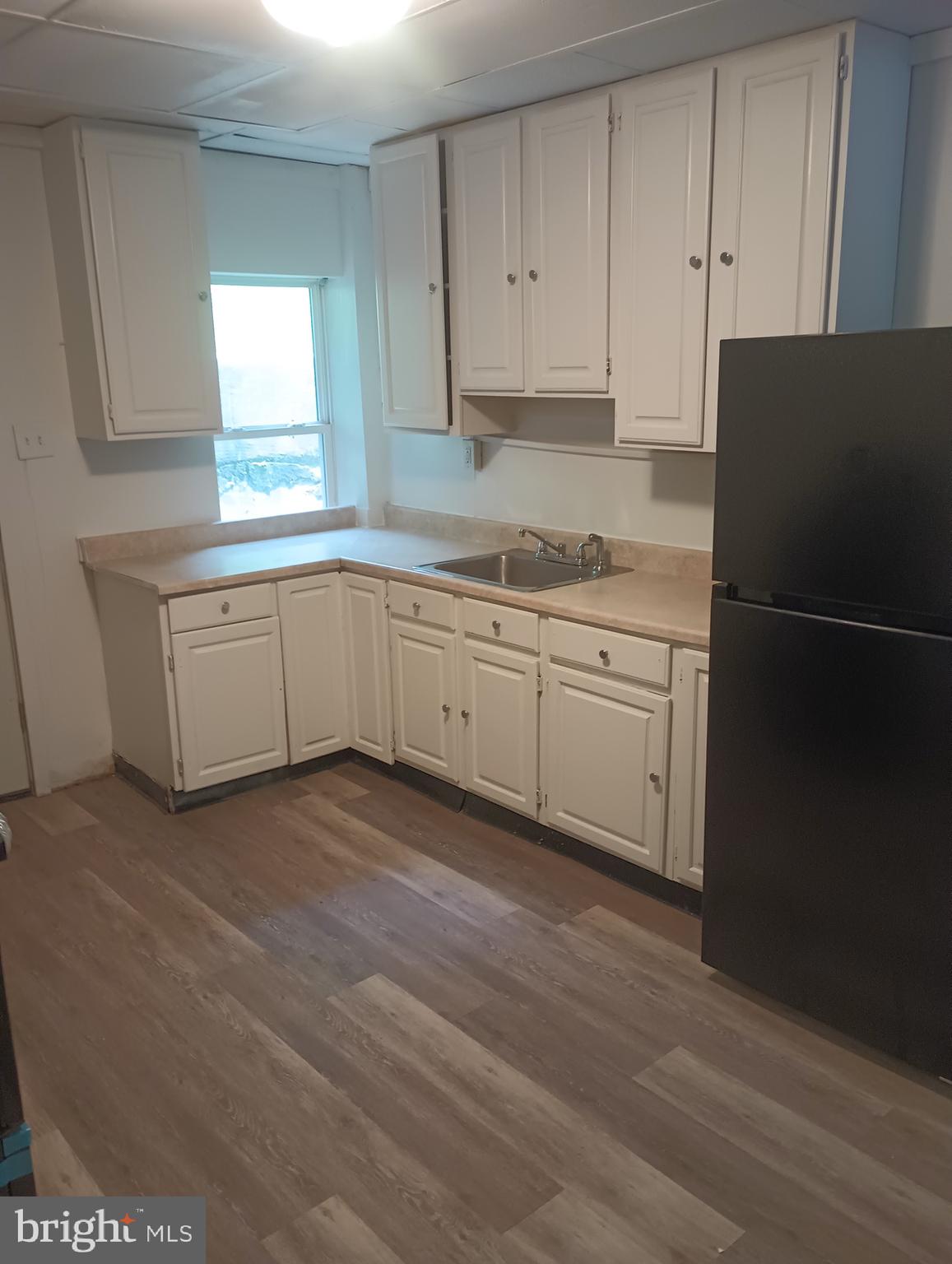 For rent is a second floor 2 bedroom 1 bath room apartment. New paint and new flooring throughout! Tenants pay all utilities. Natural gas hot water, electric baseboards and window units for A/C. No Smoking, No Pets. Tenants must have a minimum credit score of 600 or higher to qualify. Tenants are responsible for all utilities.