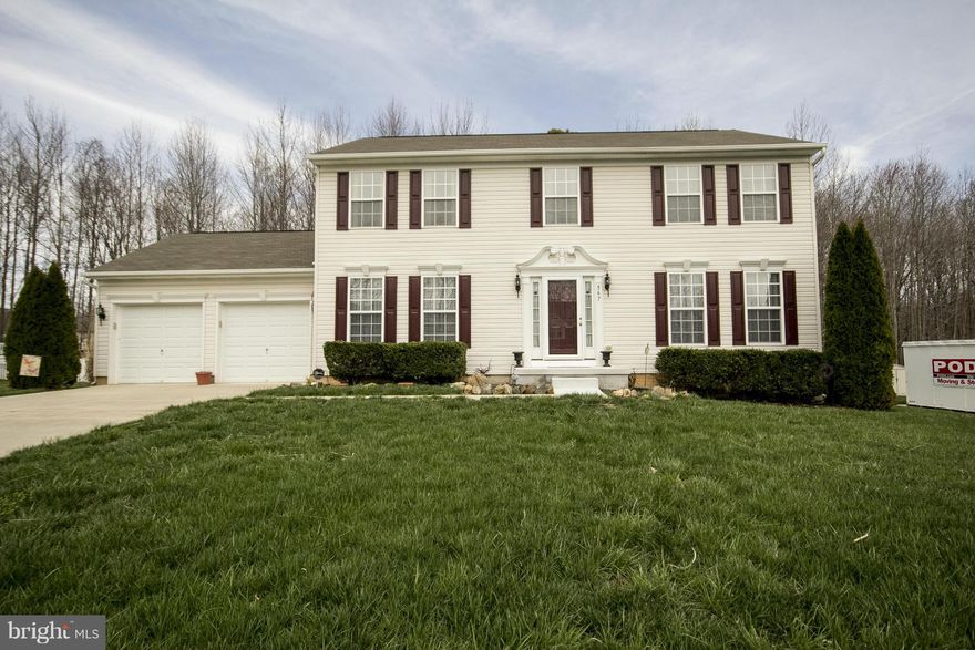 Large 4BR/2.5BA Colonial Featuring Over Sized BDRMS. Master Suite Boasts Large Walk-In Closet, Master BA w/ Soaking Tub and Separate Shower. Second Floor Laundry, Spacious Eat-In Kitchen w/ Center Breakfast Island, Separate Dining Room, Family Room w/ Wood Burning Fireplace.  Lower Level Has Studs In Place and Ready For Your Finishing Touches.  Large Deck Overlooks level yard which backs to Trees.