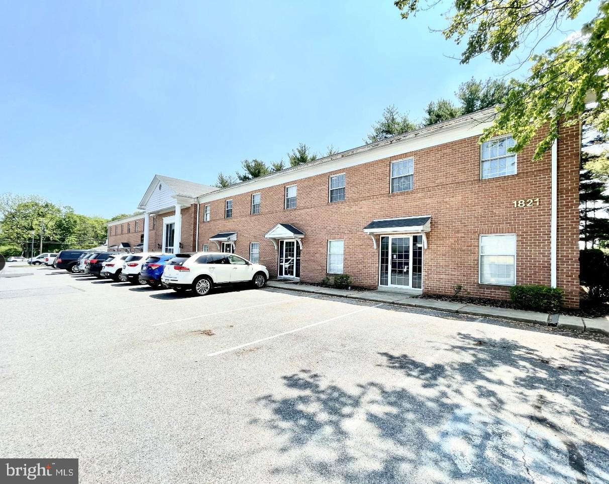 Versatile office space ideal for various professional uses! Suite #206 is +/-220 sq. ft. and features natural light and the building provides a welcoming glass entry. Tenant will enjoy access to shared amenities, including a conference room, restrooms, and a kitchen/break room. Onsite shared parking is available for added convenience. Rent is $500/month, including utilities, water, sewer, trash, grounds maintenance, common area maintenance, and taxes. Tenant is responsible for internet and liability insurance.