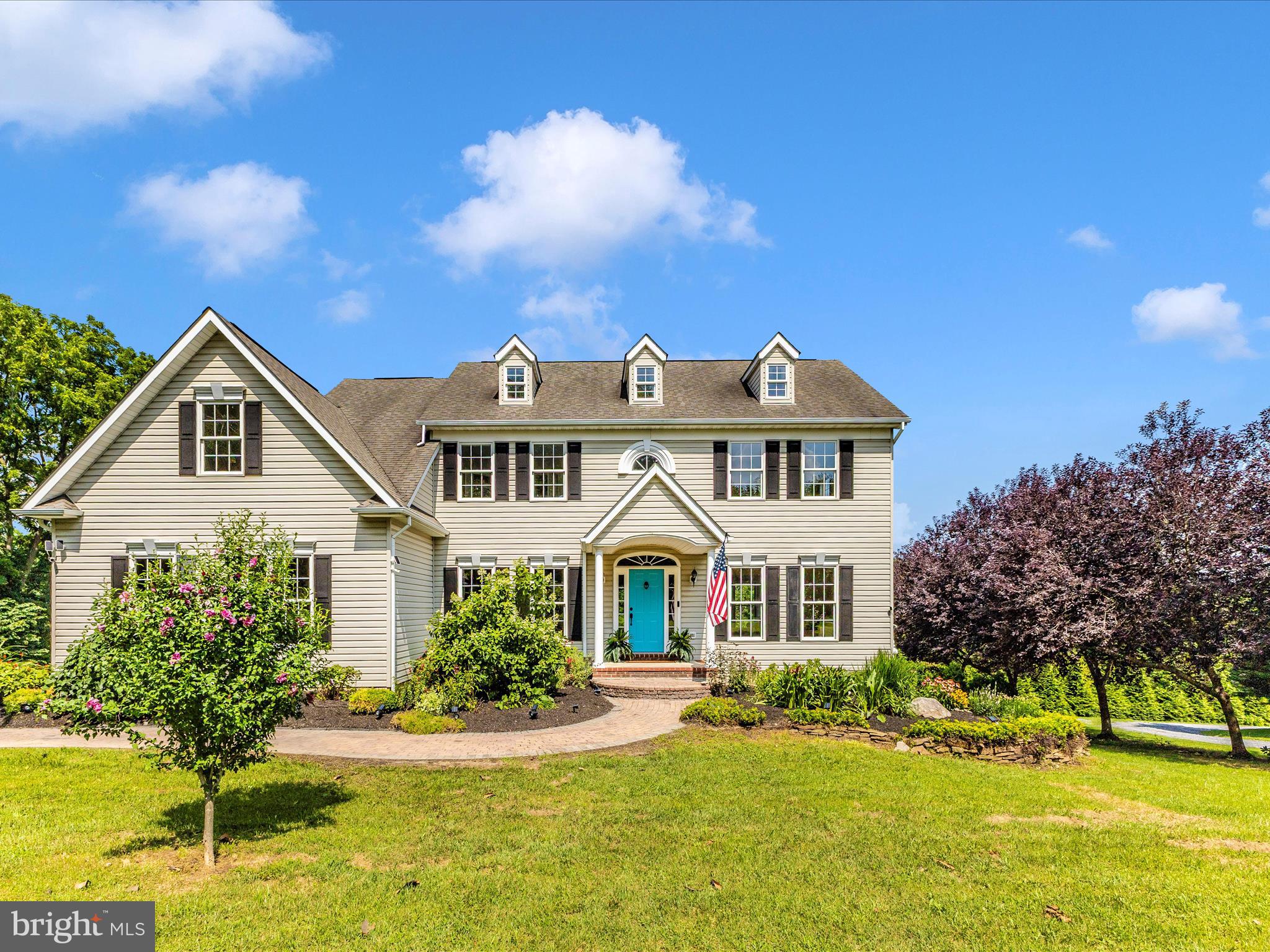 Elegant Custom Colonial with Exceptional Garage Space & Scenic Surroundings - Perfectly situated just 2 miles from I-70, this elegant custom-built Colonial offers a seamless blend of timeless architecture and modern comfort. An exceptional find for car enthusiasts, the property includes garage parking for up to 10 vehicles—with an attached garage and two detached garages—plus an expansive driveway for additional parking.
Set amidst lush, mature landscaping, a winding walkway leads you to the inviting front entrance. Inside, the main level features rich hardwood flooring throughout and is bathed in natural light. The welcoming foyer is flanked by formal living and dining rooms, flowing effortlessly into the spacious family room and gourmet kitchen. Highlights include granite countertops, a center island with seating, and stainless steel appliances.
The sun-drenched breakfast room, surrounded by windows, opens to a serene screened-in porch—perfect for dining, relaxing, or entertaining. Also on the main level is a bedroom and full bath, ideal for guests or multigenerational living, as well as a laundry room and mudroom with access to a rear staircase that leads to a large upstairs bonus room.
Upstairs you'll find brand-new carpet, four generously sized bedrooms, and two full baths, including the spacious primary suite with a walk-in closet and en suite bath featuring a dual-sink vanity, soaking tub, and separate shower.
The walk-out lower level has been partially started with permits in place—ready for the next owner's finishing touch. Framing and plumbing are in progress for a future rec room, bonus rooms, and full bath. Materials including tile, vanity, and toilet will convey to help complete the project.
Step outside to enjoy peaceful mornings or sunset evenings from the screened porch, open-air deck, or charming gazebo, all overlooking a serene, tree-lined backyard that backs to a picturesque 50+ acre farm.
The property also features a remarkable 40' x 32' pole barn with 16’ ceilings, concrete flooring, 2-post car lift, 220V air compressor, and 1’ eaves/gables—truly an automotive dream space.
Additionally, a versatile 42' x 29' bank barn offers endless possibilities for equestrian use, recreational storage, or housing a classic car collection.
Some improvements include HVAC 2022; water heater 2019; washer/dryer 2022; refrigerator 2023; stove, dishwasher & microwave 2020. Brand new carpet upper level July 2025.
Offering peace, privacy, and premium features, this one-of-a-kind estate combines rural tranquility with refined living—an extraordinary opportunity you won’t want to miss.