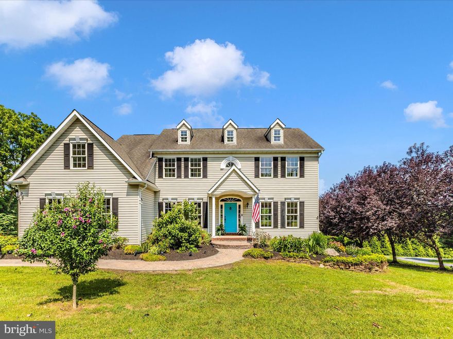 Elegant Custom Colonial with Exceptional Garage Space & Scenic Surroundings - Perfectly situated just 2 miles from I-70, this elegant custom-built Colonial offers a seamless blend of timeless architecture and modern comfort. An exceptional find for car enthusiasts, the property includes garage parking for up to 10 vehicles—with an attached garage and two detached garages—plus an expansive driveway for additional parking.

Set amidst lush, mature landscaping, a winding walkway leads you to the inviting front entrance. Inside, the main level features rich hardwood flooring throughout and is bathed in natural light. The welcoming foyer is flanked by formal living and dining rooms, flowing effortlessly into the spacious family room and gourmet kitchen. Highlights include granite countertops, a center island with seating, and stainless steel appliances.

The sun-drenched breakfast room, surrounded by windows, opens to a serene screened-in porch—perfect for dining, relaxing, or entertaining. Also on the main level is a bedroom and full bath, ideal for guests or multigenerational living, as well as a laundry room and mudroom with access to a rear staircase that leads to a large upstairs bonus room.

Upstairs you'll find brand-new carpet, four generously sized bedrooms, and two full baths, including the spacious primary suite with a walk-in closet and en suite bath featuring a dual-sink vanity, soaking tub, and separate shower.

The walk-out lower level has been partially started with permits in place—ready for the next owner's finishing touch. Framing and plumbing are in progress for a future rec room, bonus rooms, and full bath. Materials including tile, vanity, and toilet will convey to help complete the project.

Step outside to enjoy peaceful mornings or sunset evenings from the screened porch, open-air deck, or charming gazebo, all overlooking a serene, tree-lined backyard that backs to a picturesque 50+ acre farm.

The property also features a remarkable 40' x 32' pole barn with 16’ ceilings, concrete flooring, 2-post car lift, 220V air compressor, and 1’ eaves/gables—truly an automotive dream space.

Additionally, a versatile 42' x 29' bank barn offers endless possibilities for equestrian use, recreational storage, or housing a classic car collection.
Some improvements include HVAC 2022; water heater 2019; washer/dryer 2022; refrigerator 2023; stove, dishwasher & microwave 2020.  Brand new carpet upper level July 2025.  

Offering peace, privacy, and premium features, this one-of-a-kind estate combines rural tranquility with refined living—an extraordinary opportunity you won’t want to miss.