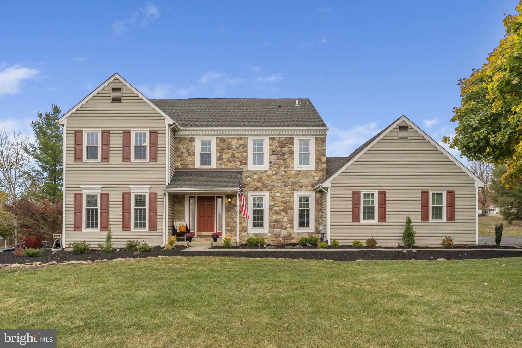 Welcome to this Old Mill Estates Colonial, with a great mix of modern and traditional touches! The two-story foyer with shadow boxes welcomes you in with the formal dining room to the right offering hardwood floors, crown molding, and chair rail.  The spacious yet cozy family room is to the left with a wood-burning fireplace with stone surround and mantle, recessed lighting, and neutral carpeting. The light and bright sunroom offers skylights, vaulted ceilings, and sliders to the oversized deck. Enjoy making meals or entertaining in the open-concept kitchen and breakfast room featuring granite countertops, stainless steel appliances, pendant lights, breakfast bar and pantry, and tile flooring.  The convenient main-floor laundry room has ample cabinet space, and access to the garage with an additional side exit. Upstairs, all bedrooms are nicely sized with ample closet space. The primary bedroom features an office or sitting area, as well as a walk-in closet. There is a full private primary bathroom with double sink, jacuzzi tub, and separate stall shower. The remaining bedrooms share a full hall bathroom with a linen closet. Downstairs, you can enjoy even more living space in the fully finished basement with a built-in bar and entertainment area. Outside, things just keep on getting better with professional landscaping, a 2-car attached garage, and a storage shed with a new roof. Many items have already been handled within the last five years including a new roof, new windows and sliders, a new hot water heater, and a new shower in the primary bathroom. All that is left to do is move in and make it your own!