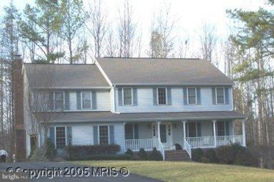 Great house on great lot in need of lots of love. Rented for past several years. Needs new carpet, paint & kitchen update. Huge master BR with tray ceiling,ceiing fan, gas fireplace, balcony, & wonderful master bath. Country front porch, 2 car garage, full walkout basement. 5+A lot - open in front & wooded in back. Lots of privacy. No HOA . Bring your horses! Convenient to I-95 & commuter lot.