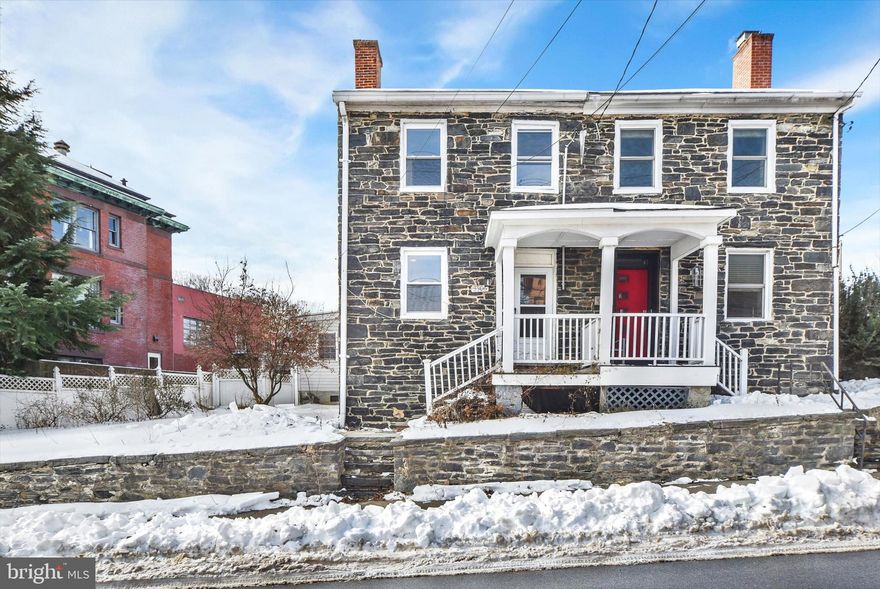 Striking stone home in historic Clipper Mill, renovated this year with high-end finishes that complement its original character. This 3-bedroom, 2-full-bath, 1-half-bath home offers a smart, comfortable layout with timeless charm and modern style.

The main level features an open living and dining area with original hardwood floors, built-ins, and exposed stone, plus an updated kitchen, a first-floor bedroom with ensuite bath, and a convenient powder room. Upstairs are two oversized bedrooms with ample storage, including a walk-in closet, connected by a Jack-and-Jill full bath.

Steps from Woodberry dining, shops, Light Rail, and nearby trails, this home offers easy city living in one of Baltimore’s most sought-after historic neighborhoods.