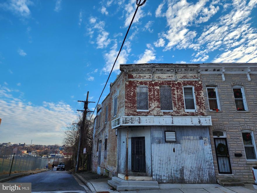 ONLINE AUCTION: Bidding begins 1/16/2023 @ 10:00 AM. Bidding ends 1/18/2023 @ 11:30 AM. List Price is Suggested Opening Bid. Deposit: $5,000. 2 Story Townhouse located in the Millhill area.
BLOCKS to Westside Shopping Center. JUST MINUTES to Carroll Park Golf Course. Easy access to major traffic artery Wilkens Ave. Property is Vacant, a shell, and in need of total renovations.