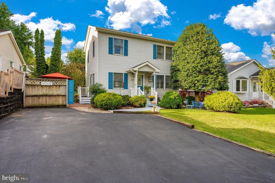 Immaculately kept colonial home, peacefully nestled on a quiet, dead-end street in downtown Brunswick. The gourmet kitchen, expansive and well-appointed, offers ample table space for casual dining and a seamless connection to a charming brick patio. This outdoor nook is perfect for grilling and al fresco meals, truly embodying indoor-outdoor living.
Descend to the fully finished basement, where a recreation room, the fourth bedroom, and a third full bathroom cater to a variety of living arrangements and entertainment needs. The basement's walkout level also grants direct access to the backyard.
The large, level backyard is a nature lover's paradise with its stone patio, storage shed, and multi-tiered garden. Here, a fig tree, apple tree, and an abundance of blackberries and blueberries thrive, offering a delightful mix of homegrown fruits. Exquisite landscaping enhances the beauty of the entire property, creating an inviting, serene ambiance.
The home is further equipped with a generous, paved driveway ensuring abundant parking, a newer roof, and a modern HVAC system. Its prime location affords effortless access to downtown Brunswick, a diverse range of shopping opportunities, major highways (340 & 70), and train connections to DC. This well-crafted home encapsulates elegance, convenience, and a warm sense of community, making it a truly spectacular place to reside.