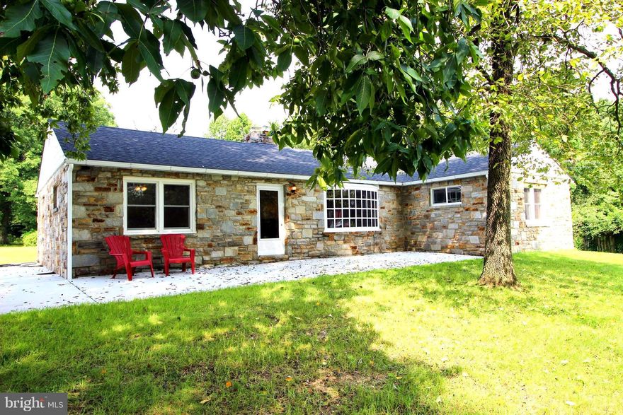 Beautiful Stone Rancher situated in Rural Setting on Two Acres! Impressive Renovated Home Features: Spacious Flr Plan, Stunning Stone FP, Mud Rm, Recessed Lighting, Newly updated HVAC,Roof & Wndws. Huge 3 Car Garage, Outbldng w/Elect & much more. Residential w/Commercial zoning - CB (community business) to be verified by buyer. Perfect for Trade Bus-Lndscapng, mechanic, etc..Don't miss this one!