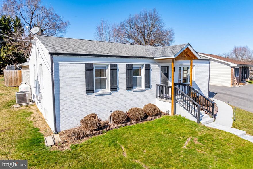 Welcome to your slice of paradise located near the heart of town! This charming brick home boasts  mountain views and the promise of tranquil living. Nestled within the vibrant town of Woodstock , this partially renovated residence offers both convenience and comfort.

The updated exterior provides eye-catching curb appeal upon arrival. Step inside to discover a thoughtfully updated interior that seamlessly blends modern amenities with timeless charm. The open concept living area is bathed in natural light, creating an inviting atmosphere perfect for relaxation or entertaining guests. 

The kitchen has been tastefully renovated with a modern touch and new appliances. Adjacent to the kitchen, a cozy dining area provides the ideal setting for enjoying delicious meals with loved ones. Beautiful hardwood flooring spans through the living area and down the hall to three of your four bedrooms. You'll enjoy a stunningly renovated bathroom with double sinks and in bath laundry area. 

At the end of the hall you'll pass through to your spacious primary bedroom with new flooring and personalized touches for a cozy feel. Enjoy two walk-in sized closets and a large private bathroom with soaking tub. A direct entryway in primary allows for easy access to your private backyard. This spacious rear yard presents endless possibilities for outdoor enjoyment. The fully fenced area provides privacy and your large screened in covered patio allows for a wonderful entertaining space and connects directly to the kitchen.

Conveniently located in town, this home offers easy access to a variety of amenities, including shops, restaurants, parks, and more. Whether you're seeking a peaceful retreat or a vibrant community atmosphere, this home is sure to exceed your expectations. Don't miss out on the opportunity to make it yours!