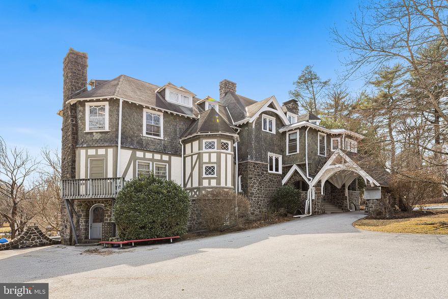 Situated on 2.7 acres of picturesque property in the heart of Easttown Township, this stunning stone mansion, built in 1874, offers a rare blend of historic charm and endless potential for one lucky buyer to transform and renew.  The home sits perched on a hill with fantastic southern exposure all year round.   The inside offers an expansive 9,551 square feet of interior living space and if brought back to its grandeur of a single property home it could feature as many as, 9 spacious bedrooms and 7+ bathrooms, providing ample room for living and luxurious entertaining.  This home is recognized as historic by Easttown Twp. and buyers will need to do due diligence in creating the next chapter of this Estate’s future.   Public water and sewer, natural gas heat from the street all make this a desirable location and offering to the buyer with a vision and creativity.    
As many along the main line know for the past 50 years, this remarkable home has served as the Tarleton pre-school providing years of fantastic memories and strong foundational beginnings.  All the while the property features timeless architectural details including wood moldings, carvings, tile and more.  Simply put, this is an incredible renovation opportunity. Whether you're looking to restore the grandeur of its original design or transform it into a modern masterpiece, the possibilities are endless.
The sprawling grounds offer a private, tranquil setting, perfect for outdoor living, gardens, or potential expansion. With its rich history and prime location in Berwyn, this property is waiting for a new chapter, ready to be reimagined as a stunning family estate, luxury retreat, or unique investment opportunity.
Don't miss the chance to own a piece of history—schedule a tour today and let your vision for this extraordinary mansion come to life.
PLEASE do not walk property without a confirmed showing appointment.