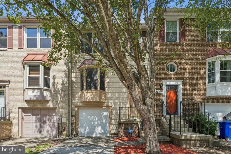 Welcome to 3539 Emperor Court, a beautifully maintained townhouse nestled in the highly sought-after community of Bowie. This spacious 3-bedroom, 2.5-bathroom home offers the perfect blend of comfort, style, and convenience. Step inside to find an open-concept main level featuring gleaming hardwood floors, a bright living room with bay windows, and a dining area perfect for entertaining. The modern kitchen boasts sleek cabinetry, stainless steel appliances, a custom tile backsplash, and direct access to a large deck — ideal for enjoying your morning coffee or hosting summer barbecues.

Upstairs, you'll find three bedrooms, including a primary suite with a walk-in closet space and a private full bath. The lower level provides additional living space and access to a fully fenced backyard, offering a private outdoor retreat for relaxation, gardening, or pets.

Enjoy the convenience of a one-car garage, dedicated laundry area, and proximity to shopping, dining, commuter routes, and local parks. With thoughtful updates and move-in ready condition, this home is a must-see!