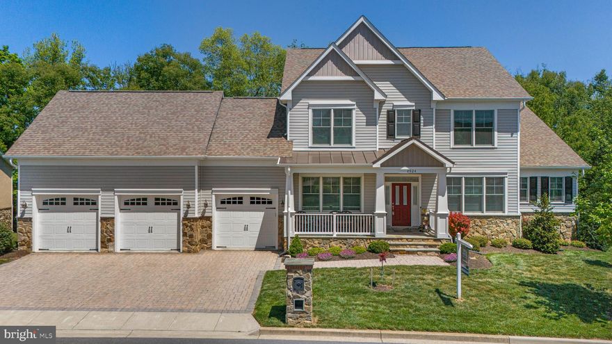 The River View Estates at Mill Island - this customized home offers exceptional WATERFRONT VIEWS and scenic vistas - 2 private decks and full walk-out lower level with full size windows and 2 double walk-out exits. Enter from a covered front porch and you are greeted by an open plan with huge windows to a large open porch taking advantage of the sweeping views from a 2-story great room with fireplace. The GR is open to the kitchen with a 10-foot island perfect for gathering, and an informal dining room/breakfast room with walls of windows to take advantage of the scenic water views. Off the kitchen is a large mudroom, walk-in pantry, and private deck tucked behind the garage perfect for morning coffee. A FIRST FLOOR PRIMARY SUITE is complimented by walk-in closet and spa bath with free standing soaking tub and huge walk-in shower plus additional closet storage! Ascend to the second level from an atrium room/open staircase to the second level with 3 additional bedrooms and 2 baths. Truly a remarkable setting, home and community. Located on Mill Island with a large nature preserve, enjoy a quiet neighborhood bounded on one side by the Monocacy River and the other by Tuscarora Creek; once you cross the bridge onto the island leave your cares behind. No thru traffic, miles of paved marsh trails in a protected wildlife area to jog or stroll offer a sense of quiet solitude. There is also an area to launch kayaks on the Monocacy side. Resort amenities include a clubhouse featuring areas to lounge and entertain, a workout room, Game room, locker rooms, library, adult pool, kids pool, lap pool, tennis courts and putting green. Stroll to the Worman's Mill Town Center for indoor and outdoor dining at local restaurants, convenience stores, a town square with outdoor weekend summer concerts and food trucks. Agents please see agent remarks.