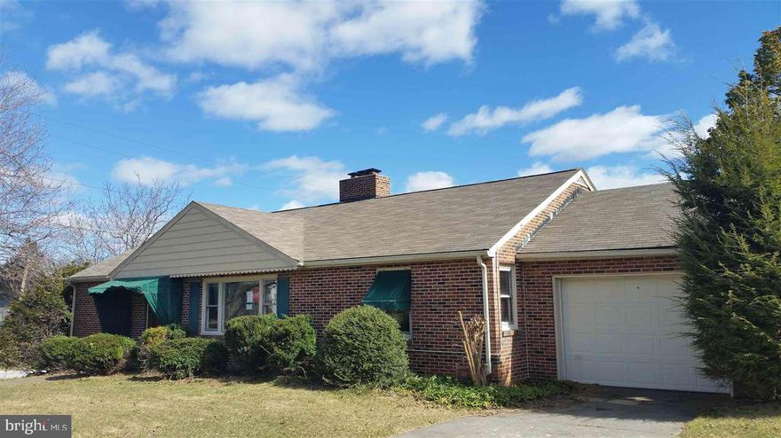 Tons of potential here! This brick ranch home offers loads of curb appeal with great possibilities inside! Hard wood floors, large kitchen, huge covered patio, sunroom, and an addition on the lower level that walks out to the picturesque back hard, and also gives much more space that you would expect!