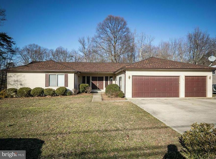 RARE OPPORTUNITY to enjoy one-level, open-spaced living in a water privileged community near downtown. Just updated throughout.New HVAC, water heater, kitchen (granite, stainless, cabinetry, recessed and decorative lighting), bathrooms top-to-bottom, built-in wet bar, new carpeting, freshly painted, cathedral ceilings. Three large decks enable expanded living space. Wood-burning masonry fireplace.