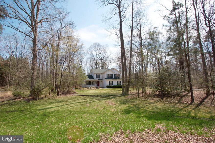 Welcome home! Dogwood trees and lovely landscaping with this beautifully well kept home await you at the end of the cul-de-sac, Large spacious open floor plan. Dining room has built in book/storage shelving and bench seating. Family room with fireplace opens to kitchen w/ sliders to your large back deck. This home backs to trees for ultimate privacy. Storage shed stays. Just moments from PAX.