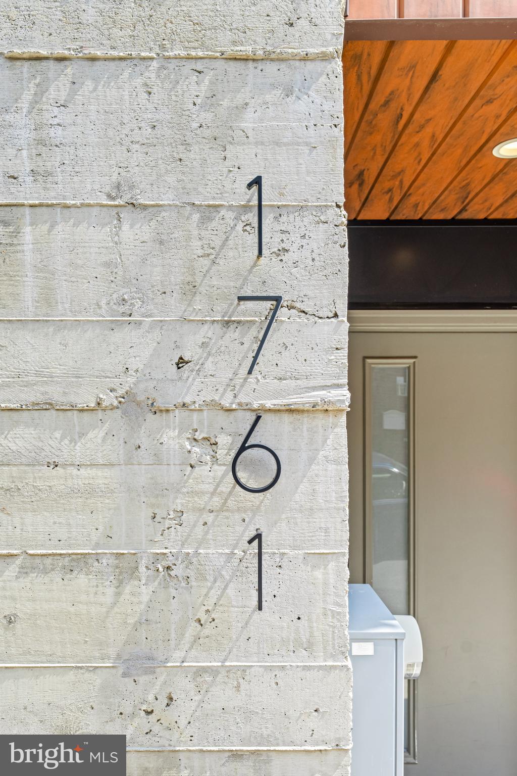 Welcome to this spectacular five-story urban retreat in the heart of South Kensington, nestled between Northern Liberties and Fishtown! This modern residence boasts a striking exterior with a blend of concrete, Hardi plank, and steel siding, creating a truly unique aesthetic. Step inside the welcoming foyer, which offers a dedicated office space ideal for remote work, access to a convenient powder room, and a spacious closet. The foyer seamlessly connects to the upper and lower levels and the private garage, ensuring easy and efficient flow throughout the home. The lower level is an entertainer's dream, featuring a finished basement with a chic wet bar, wine fridge, and plenty of storage space. On the main living level, natural light pours through large windows, highlighting an open-concept kitchen, living, and dining area. The chef's kitchen is equipped with a premium Bosch stainless steel appliance package, double wall ovens, and a stylish chef's faucet. The stunning living room is centered around a gorgeous, remote-controlled gas fireplace with exquisite detailing, creating a cozy ambiance perfect for relaxing or entertaining. This space opens to a maintenance-free deck, ideal for outdoor enjoyment. The third level offers two spacious bedrooms with ample closet space, abundant natural light, and a sleek hall bathroom. The top floor is home to the luxurious primary suite, featuring amazingly high ceilings, two Juliet balconies, custom built-ins, and an en-suite bathroom with dual vanities and a rain head shower. From the primary suite, access the pilot house leading to a rooftop deck with breathtaking skyline views of Center City and the Ben Franklin Bridge, perfect for entertaining or unwinding. This home is equipped with a two-zone HVAC system, a sprinkler system, and a tankless water heater, ensuring comfort and convenience year-round. Additional features include a private garage accessible from Montgomery Avenue. Located just steps from Fishtown's best amenities, including top-ranked restaurants like Kalaya and Suraya, the vibrant Frankford Avenue corridor, and easy access to the Berks El subway stop, this home offers the ultimate in luxury urban living. Plus, with five years left of tax abatement, this is an opportunity you won’t want to miss in the exciting Regent Row development that beautifully marries the area's industrial heritage with contemporary design.