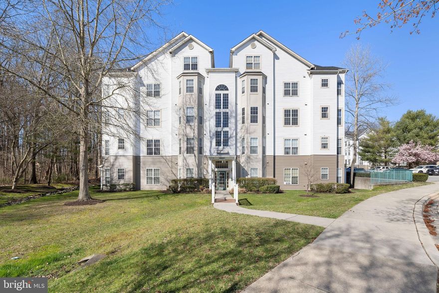PRICE REDUCED AND BACK ON THE MARKET!!!  This spacious, Three Bedroom, two Full Baths, second-floor condo in the highly sought-after Woodland Lake Condo Subdivision of Bowie is ready for you to move in.   Six-foot windows provide plenty of natural light in this well-kept home.  Both full baths have been updated.  The Primary Bedroom with En Suite Bath offers a large Soaking Tub for relaxation.  The cozy Living Room features a Marble Surround, Gas Fireplace that provides comfortable heating on those cool evenings indoors.   Eat-in Kitchen has ample counter and cabinet space.  Step outside to the large balcony to enjoy your morning coffee, evening beverage, and meal as there is room for outdoor furniture.  There is a good-sized storage closet on the balcony for your additional storage needs.  This home comes with  a modern LG Washer and Dryer.  It's ready for your family and your belongings.  This wooded, scenic community offers a Pool and Community Room for your enjoyment.  Location, location, location! Convenience? This home is close to Allen Pond,  Bowie Town Center which offers varied retail shopping and several restaurants both casual and Fine Dining.   Bowie Medical Center, multiple Medical Providers, Imaging Centers, Safeway Grocery Store, Bowie Senior Center, and  Regal Movie Theater are all within a two-mile radius.   It's close to Route 50 and 495 Capital Beltway main roadways.  Washington DC is approximately 30 minutes via Rt 50 West by car.  Annapolis is approximately a 15-minute drive via Rt. 50 east. Don't miss this one! Schedule your showing and make your offer before it's sold.