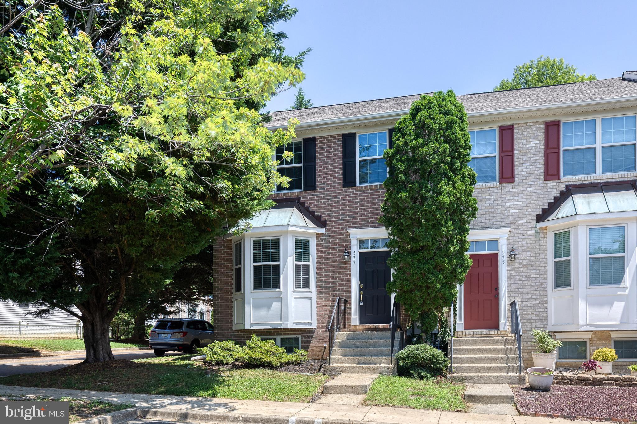 An incredible find; Welcome home to 577 Francis Nicholson Way, a rarely available end unit townhome residence in the highly desirable Tidewater Community! With fresh carpet on the main & upper floors along with new roof (1 year old), newer HVAC (under 2 years old), and newer hot water heater, move in complete peace of mind! Past the hardwood laden foyer, the kitchen flows with hardwoods, granite countertops, stainless steel appliances, and a breakfast nook perfect for morning coffee. The hardwoods continue through the dining room which flows to a fresh-carpet laden family room complete with gas fireplace and sliding door to the deck & backyard. Upstairs the primary bedroom shines with natural light on the vaulted ceiling, and it's ample size compliments the walk-in closet. An en-suite primary bathroom is ready for your personalized touches. The second bedroom, also with new carpet, is past the hallway second-full bathroom. A fully finished basement has a sizable living room and graciously spaced third bedroom equipped with full bathroom. To round out this incredible offering is Tidewater Colony's incredible community amenities complete with pool, tennis courts, club house, community center, and so much more!
