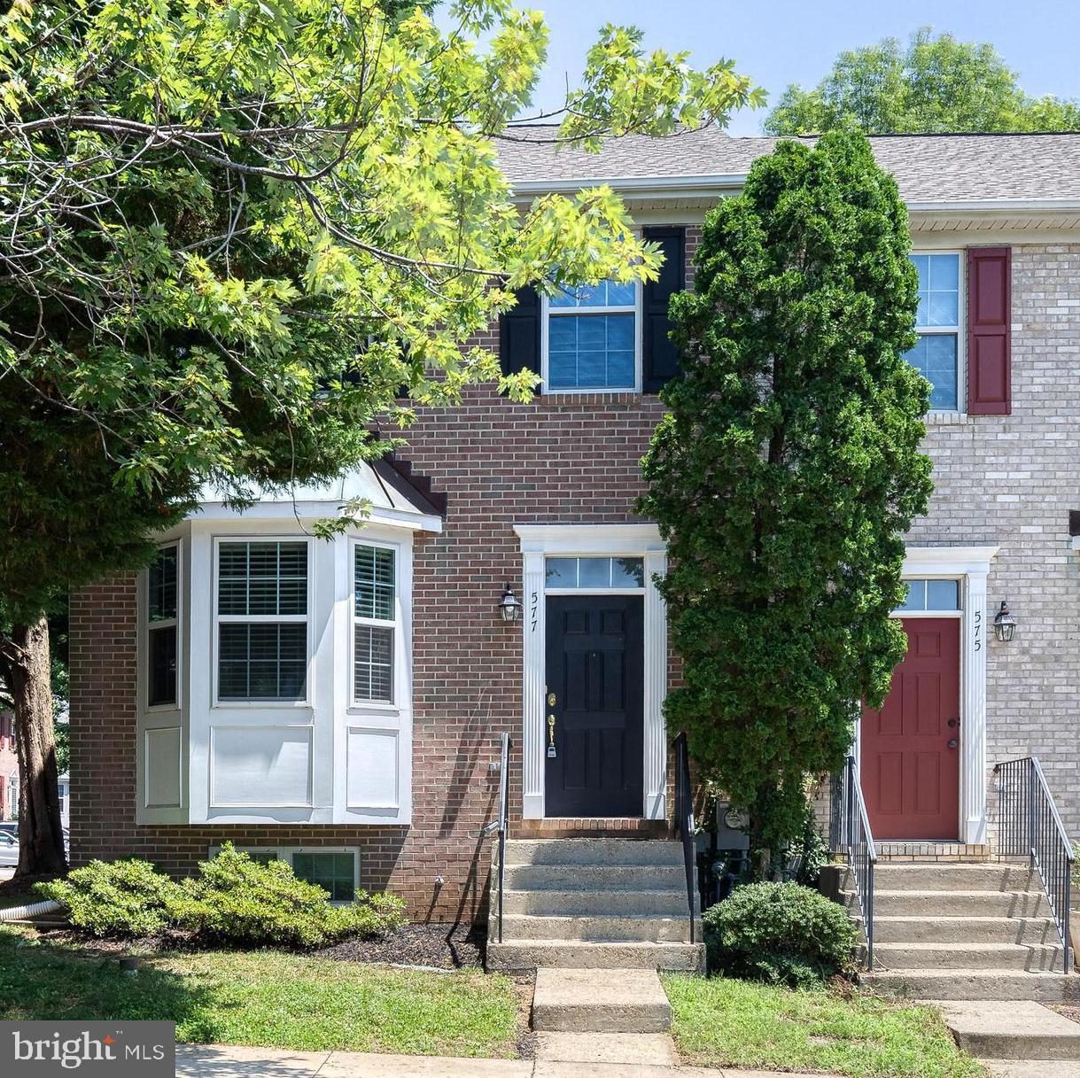 An incredible find; Welcome home to 577 Francis Nicholson Way, a rarely available end unit townhome residence in the highly desirable Tidewater Community! With fresh carpet on the main & upper floors along with new roof (1 year old), newer HVAC (under 2 years old), and newer hot water heater, move in complete peace of mind! Past the hardwood laden foyer, the kitchen flows with hardwoods, granite countertops, stainless steel appliances, and a breakfast nook perfect for morning coffee. The hardwoods continue through the dining room which flows to a fresh-carpet laden family room complete with gas fireplace and sliding door to the deck & backyard. Upstairs the primary bedroom shines with natural light on the vaulted ceiling, and it's ample size compliments the walk-in closet. An en-suite primary bathroom is ready for your personalized touches. The second bedroom, also with new carpet, is past the hallway second-full bathroom. A fully finished basement has a sizable living room and graciously spaced third bedroom equipped with full bathroom. To round out this incredible offering is Tidewater Colony's incredible community amenities complete with pool, tennis courts, club house, community center, and so much more!