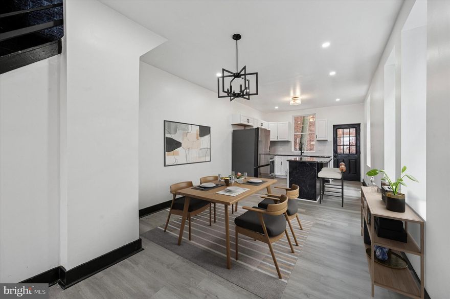 Welcome to 1303 N 61st Street.  This beautiful 3 bedroom 2.5 bath renovated home blends classic charm with modern touches, offering spacious rooms and high-end finishes throughout. From the open concept living areas to the cozy bedrooms and updated bathrooms, this home is designed for both comfort and style.  Freshly painted exterior with bold black and white tones, and a charming front porch. A private, fenced enclosed backyard with concrete flooring, perfect for outdoor activities or gardening. 

The open concept living space welcomes you with natural light pouring in through oversized windows. New vinyl plank flooring flows throughout, complimented by an electric fireplace, and sleek black accents.  The dining area transitions seamlessly into the kitchen, with modern finishes including a stunning island perfect for entertaining. The kitchen has brand-new stainless-steel appliances, including a fridge, microwave,  stove, and dishwasher. White cabinetry and a clean tile backsplash add brightness to the rest of the kitchen. The first-floor powder room features a vanity with a vessel sink and black hardware, offering both style and practicality.

The home features generously sized bedrooms with abundant natural light. Ceiling fans add elegance to each room. The master bedroom suite showcases a bold geometric accent wall and a sliding door leading to a walk-in closet and a full-size bathroom. The bathrooms maintain the home's stylish aesthetic, with sleek black-and-white tones and modern fixtures. The master bath includes a new tub/shower setup with a vanity bowl and a sophisticated black border. The additional bedrooms provide ample closet space, perfect for a variety of needs for children or guest rooms with their own full hallway bathroom. 

Downstairs, the fully finished basement offers additional living space with modish marble- look flooring. The basement has exposed black ceilings for a trendy industrial feel, and a separate laundry area with a washer/dryer combo. 

This home includes brand new Heating System, Plumbing, Electric Panel 200amp &  Central Air throughout. This is not your average typical house, make it your home. With such a competitive market, definitely will not last. Call & schedule your appointment. First come, first serve! Open for offers!!

**Some pictures are virtually staged to show you the home furnished