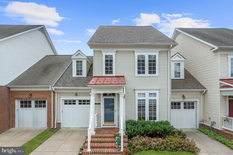 Beautiful Enclave at Ellicott Hills Villa boasts a spacious Clairmont floor plan with private, back-living quarters offering a spectacular scenic view, and resort-like community amenities that include a clubhouse, fitness center, swimming pool, and tennis courts!  Move-in ready, this pristine home has been lovingly maintained with updates including a NEW roof, flooring, carpet, blinds, appliances, patio, air conditioning unit, and more!   Gorgeous Brazilian hardwoods and exceptionally wide archways are showcased throughout the main level that begins with a sun filled foyer opening to the home office.  Accent crown molding and chair railing are detailed in the formal dining room creating the perfect ambiance for intimate gatherings.  A soaring vaulted ceiling with skylights provides abundant natural light in the living room that offers deck access and adjoins the renovated kitchen that features an island breakfast bar under pendant lighting, display cabinets, and stainless appliances.  The primary suite is conveniently located and includes a sitting room, 2 walk-in closets, and luxury bath with a soaking tub, a custom Sterling Mirror and Glass frameless shower, and dual vanity.  Ascend the stairs to a spacious loft with front and back overlooks and a walk-in storage closet, two sizable bedrooms, and a full bath, completing the upper-level sleeping quarters.  Customize the full, walkout basement that highlights 12 ft. ceilings, a bath rough in, and sliding door to the backyard.  Backing to woods for privacy, you’ll enjoy outdoor living on the deck and patio embellished with river rock and stepping stones and offers breathtaking views. Commuter routes MD-29, 40 and 70 provide easy access to Baltimore, Washington D.C. and BWI airport. Nearby Ellicott City offers dining, shopping, and entertainment options.  Don’t miss this spectacular home!