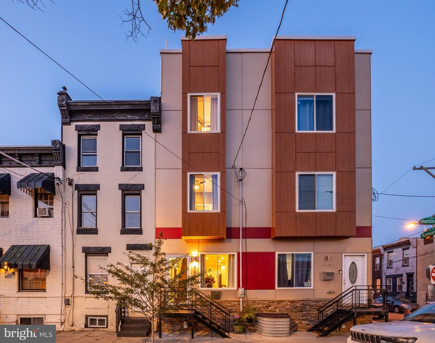 Welcome to 2579 East Huntingdon Street, a stunning and meticulously maintained newer construction in Olde Richmond, a rapidly developing yet hidden gem just a stone's throw from Fishtown. With an abundance of on-street parking and walkability to one of Philadelphia's hottest neighborhoods, the convenience factor is unparalleled. Step inside to the cozy formal living room, perfect for welcoming guests and enjoying quality time with loved ones. The open concept, straight-through layout flows seamlessly into the dining room and chef’s kitchen, featuring stainless steel appliances, quartz countertops, two-toned shaker cabinets, and a stylish tile backsplash. Exit through the rear door to your dream patio, recently remodeled with a stained horizontal wood plank fence, perfect for morning coffee or evening cocktails. The second floor offers two spacious bedrooms and a full hallway bath with brand new glass shower doors. Make your way to the third floor to discover the primary suite, boasting a breathtaking view of Center City, a large double door walk-in closet with built-in shelving, and a primary full bath with a double vanity. Ascend to the private rooftop deck with a cozy seating area, providing an exceptional vantage point for a morning sunrise or evening sunset. The fully-finished lower level is perfect for movie nights with its comfy atmosphere and features a dark and moody third full bath, ideal for guests. This versatile space can also serve as a fourth bedroom if desired. Lastly, this home has approximately 5 years remaining on a FULL TAX ABATEMENT. Local gems include Green Rock Tavern, Cook and Shaker, Little Suzie’s Coffee & Pie, Starbucks, IGA, Pop's Dog Park, Il Ghiottone, Tacconelli’s, and the famous Stocks Bakery. Commuting is a breeze with close proximity to I-95, the Route 15 Trolley along Richmond Street, and the Market-Frankford Line at Huntingdon Station. Additionally, you're a short drive to Center City and 13 minutes to PHL Airport. With the recently completed Northbank waterfront community and 95 Revive projects, as well as the upcoming Graffiti Pier and 2507 Almond Street developments, this area promises significant future growth and appreciation. Seller is a licensed PA real estate agent.