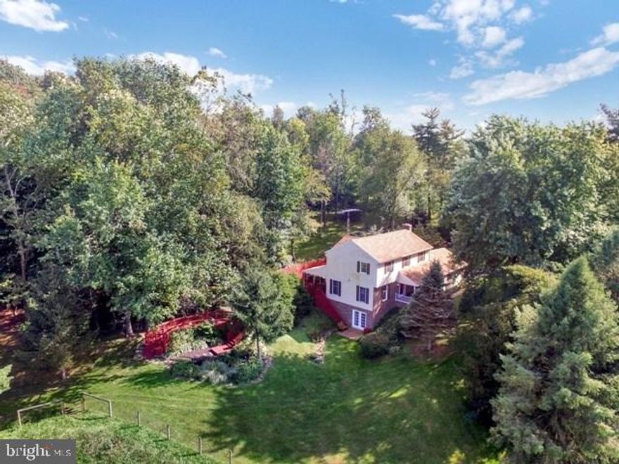 You will be intoxicated with the natural beauty of this delightful 4BR, 3.5BA home, with finished walkout lower level. Nestled on 5 acres and located minutes to major arteries and conveniences. Neighbors include deer, wild turkey and other furry creatures. Bring your own animals! There's room for them and your "toys" in the 20x40 pole barn with fenced pasture. Writer, artist, reader...escape to the 1-room house, w/covered porch and fireplace.