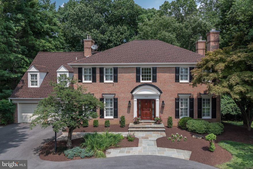 OPEN SATURDAY AUG. 12TH  1:00PM-3:00PM! Exceptional High Meadow Estate boasts timeless craftsmanship and stunning design elements with three light filled levels of gracious living and a spectacular outdoor oasis! Exquisitely expanded and renovated, this special home offers incredible gathering space, making this classic colonial ideal for daily living and entertaining. Extraordinary curb appeal abounds with a gracious circular driveway, stately brick façade, flagstone walkway and covered entrance with mahogany door. Inside, smart lines, custom millwork, beautiful appointments, and rich hardwoods, create exceptional light filled living space. Upscale living awaits you with a gourmet Chef’s center-island kitchen with custom cabinetry, quartz countertop, sophisticated tile backsplash, professional series appliances including a Wolf 5-burner gas range and a coffee/wine bar with stained mahogany cabinets, beverage refrigerator and antique mirror backsplash. A stunning breakfast room complete with a raised hearth fieldstone fireplace, beamed ceiling, and crystal chandelier opens to the stunning family room edition. Custom crafted, this exceptional addition provides magnificent panoramic vistas of the outdoor oasis and features a barreled ceiling, cove lighting, three sets of French doors, a built-in mahogany entertainment center and access to the elevated deck and terraced flagstone patio. The living room offers a sophisticated sitting room with a gas fireplace and extends to the formal dining room, complete with custom moldings, a crystal chandelier and bay window with door, leading to the elevated deck. A private office with built-ins provides an ideal space for remote work. The renovated mudroom with two closets and cabinet with pull-out drawers provides much needed storage. An elegant powder room completes the beautiful main level. Retreat upstairs and you’ll find four bedrooms, including a luxurious primary suite, three full bathrooms, a spacious laundry room and hallway with hardwood flooring and attic access. The primary suite offers three walk-in closets, plus a spa-like bathroom with an oversized shower stall with three shower heads, a soaking tub, a travertine topped double sink vanity and separate water closet. The second ensuite bedroom offers a renovated bathroom with a tub/shower with subway tile and large vanity with marble countertop. The two freshly painted rear bedrooms share an updated bathroom with a walk-in shower stall. Conveniently located on the upper level, the laundry room features a front load washer and dryer and two large linen closets. The gracious living space extends to the renovated walk-out lower level. Two staircases, including an open hardwood staircase with custom railing, provide a cohesive flow. The lower level is an entertainer’s dream with a kitchenette including rich cabinetry, a granite countertop, a two-drawer dishwasher, a beverage refrigerator, and eat-in bar. The fourth full bathroom offers a stunning walk-in shower, plus a second washer & dryer, convenient for swim towels and gear. A raised hearth fieldstone fireplace with gas-insert is a stunning focal point in the expansive club room.  A separate room with closet is ideal for exercise, crafts, or work. The impressive living space continues outside where you’ll find unparalleled beauty and tranquility. Escape to your own private oasis with a lush tree-lined .67 acre with mature trees, professionally manicured grounds with sprinkler system, a stunning swimming pool with a waterfall feature and extensive hardscape, including an elevated deck, a terraced flagstone patio for dining and expansive covered flagstone patio for poolside gathering and entertaining. Nestled off of a cul-de-sac, this distinctive property offers upscale living and a superb location, convenient to local area attractions, shops & restaurants, plus key commuter routes. Welcome & Enjoy!