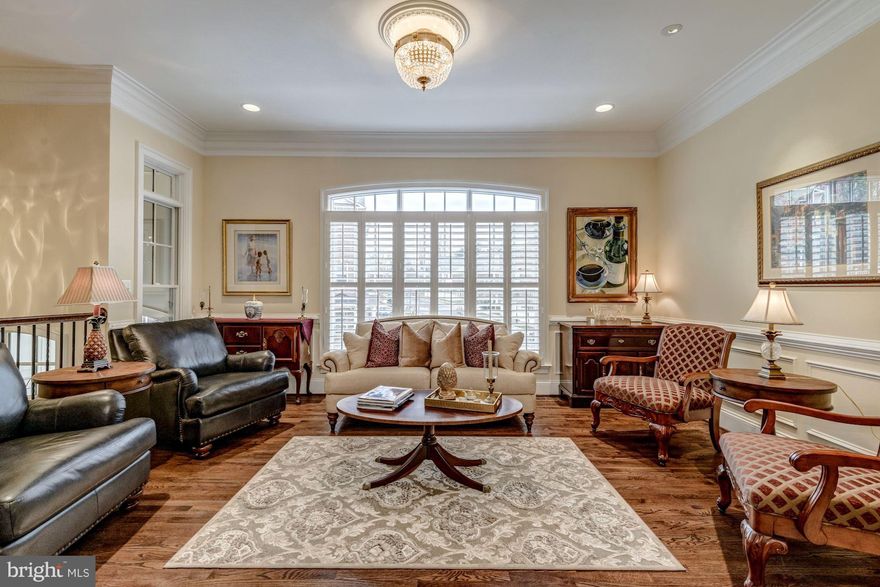 Beautiful luxury townhome in premium location privately tucked in the back of the community backing to trees next to walking path to Haycock Park * Upgrades throughout * Gourmet custom kitchen with Viking Stainless Steel Appliances * Dual-sided fireplace * Plantation shutters throughout * Upper level deck and lower level patio with scenic vistas *  One mile to West Falls Church Metro