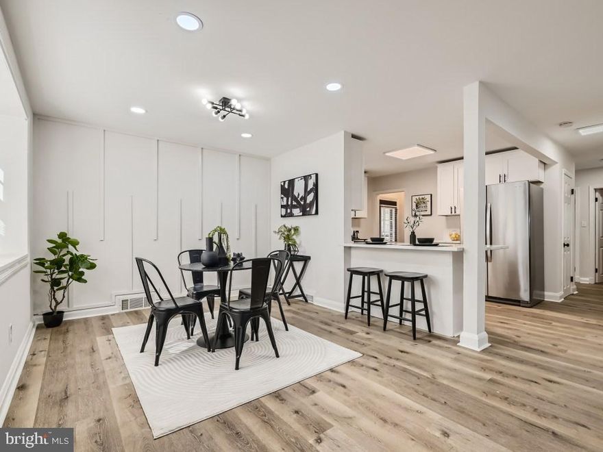 Introducing function, style and comfort all in one home here at 5302 Chrysler Avenue.  Beautifully renovated in 2023, you will find all new luxury vinyl floors, white shaker cabinets, black matte pulls, new bathrooms, new stainless steel appliances, designer bathrooms and custom millwork. Walk into the stylish family room and prepare to be wowed with the space and design. Enjoy meals at the island or nearby in the dining room adorned with a wall of elegant trim work. Open floor plans allows you to use the spaces in anyway  you desire! Utilize any of the 3 bedrooms and full bathroom on the main level or head downstairs into the fully finished and functional basement where you can create an additional suite for a potential roommate/tenant, guest, in-law, or yourself! The basement boasts a large rec space and an entirely different suite featuring a private bedroom and full bathroom. So much privacy for one to enjoy! One has the freedom to use this space and enter/exit the home through the side entrance and not disturb anyone on the main level. Nothing like it on the market! But it doesn't end here! Relax or entertain in your three season room overlooking your large private lot. Such a beautiful piece of property! Park your car or small motor vehicles under the carport. Long driveway lends itself to parking for multiple cars--and plenty of street parking for guests! You do not want to miss out on the opportunity to call this your home! Schedule an appointment and come see it today.