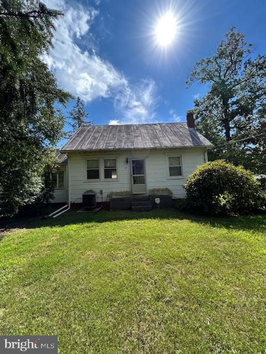 1 bedroom 1 bath cottage, family room, eating area, kitchen, full laundry on main level. Central air and heat. Heat Pump with Oil emergency heat, 1 space covered garage, small exterior storage area. Cute and quaint with circular driveway, Well and septic.  Call listing agent for application process. Sorry no pets.