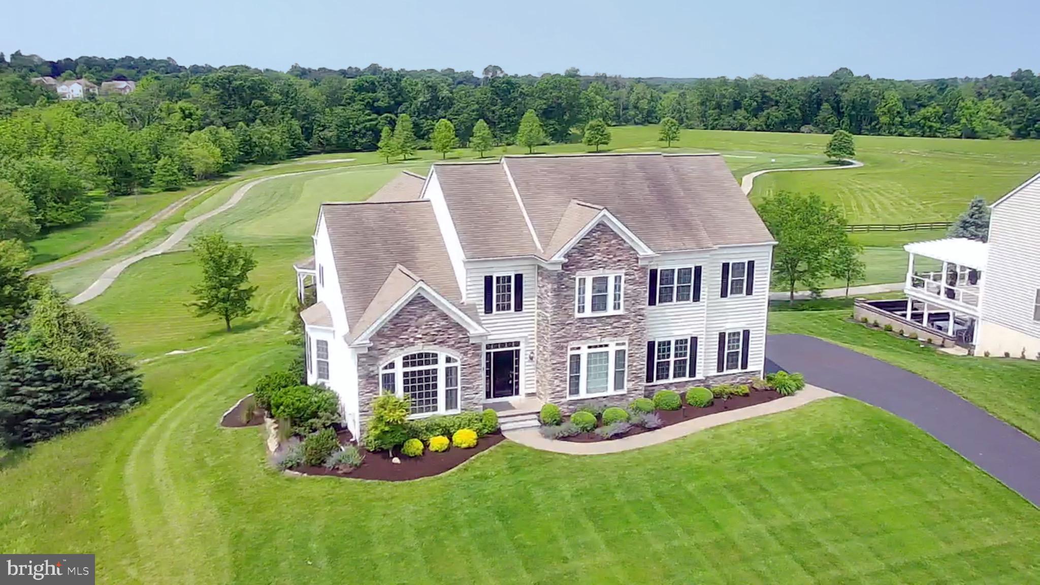 The Hardwick model is part of a special collection of Pulte-built homes inside the Applecross Country Club, and this home does not disappoint! The Hardwick model has a modern dynamic floor plan & there are only a few spread out through Applecross. As you approach, you can’t help but to notice the spectacular golf course view that you will get to enjoy from nearly every room in this home. Home features one of the most premium lots in all of Applecross as it sits high above hole 1 & hole 2 of the golf course while providing breathtaking views of the golf course and the East Brandywine countryside. The custom hardscaped path leads you to the front door, where beautiful hardwood flooring draws you inside to the two-story foyer that overlooks a grand staircase, complete w/shadow-boxed wainscoting & crown molding. The adjoining living room features huge windows to allow for an abundance of morning sun. Architectural pillars separate the adjacent dining room that feature bump-out windows for that perfect Victorian flair, as well as Dentil crown molding. French doors lead to the spacious study offering floor-to-ceiling windows adding sunlight to your productivity! A spacious mud-room suite connects to the rear entrance, complete w/tile flooring, two large closets & access to a convenient first-floor laundry room. To the rear, you’ll find an expansive family room w/ a soaring two-story ceiling & a double gas marble fireplace that connects to the sunroom, with floor-to-ceiling windows offering spectacular golf course views. The chef of the family will fall in love w/the large gourmet kitchen, adorned w/sprawling granite countertops, premium cabinetry, tile backsplash, & equipped w/premium stainless steel appliances, including a dual-wall oven & large gas range. The eat-in area is bathed in natural light with two walls of windows that face the golf course. Sliders lead to the entertaining-size deck which includes a covered gazebo, with magnificent views of the golf course and countryside. Enjoy golf course views and breathtaking sunsets as your backdrop every night while relaxing in the built-in gazebo
Back inside upstairs, you’ll find the large master bedroom suite that features a dramatic tray ceiling and another wall-of-windows offering elevated views. His-and her closets provide plenty of storage opportunities. The generously-sized second and third bedroom enjoy a large Jack &Jill hall bath, with double vanity. A large fourth bedroom suite which includes its own full bath rounds out the second floor.
The full finished walk-out basement is one-of-a-kind! A spacious fifth bedroom offers versatility, while the additional living space is perfect for entertaining and recreation! A kitchenette serves this area well, which features a premium home theatre system with ultra high-definition projector and built-in Dolby surround sound—you’ll never want to go to the movies again! After the movie, bring the spa home! A premium two-person sauna perfectly complements the large steam shower in the full bathroom! Plenty of storage areas are offered in the basement, which adds to the attached two and a half-car garage with extra workshop area!
The location is perfect as this home provides an easy walk to the pools, fitness center, and additional Applecross amenities! Applecross is conveniently located near several parks, shopping & restaurants, and located near major travel routes. Enjoy the award-winning Downingtown School District and take advantage of all that Applecross offers: A state-of-the-art fitness center and the -Studio T- exercise/dance studio, indoor and outdoor pools, Caribbean pool bar, Nicklaus-designed golf course, tennis, fitness classes, social events/parties, full restaurant/bar, family events, basketball and more! Applecross - Live Where You Play! This is a must-see home.