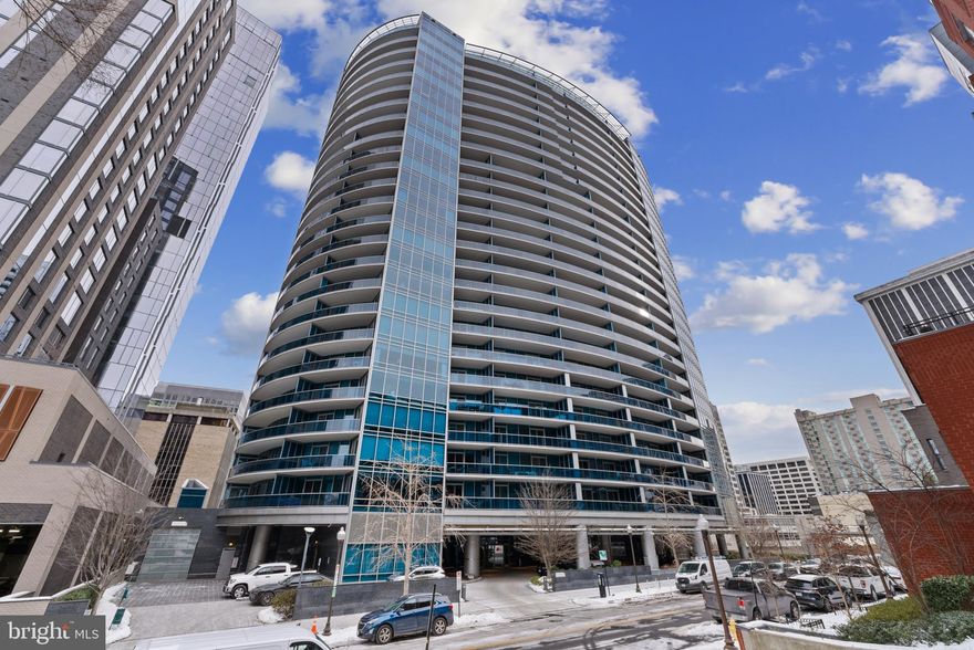 Welcome to unit 804 at Turnberry Tower, is a luxurious 1,645-square-foot condominium featuring 1 bedroom plus a large den and 2 bathrooms. This contemporary residence boasts high-end finishes, including a gourmet kitchen equipped with premium appliances and a modern design with a spacious layout.   The kitchen offers gas cooking, Subzero and Miele appliances, and Snaidero cabinets.   The large primary suite features an elegant, spa-like marble primary bath complete with a jacuzzi tub, a separate glass enclosed shower and 2 walk-in closets. 

This sophisticated condominium showcases exceptional amenities including a fitness center, a private theater, and a year-round heated indoor pool.  The building offers 24-hour concierge services, valet parking, and 1 assigned parking space for the unit. 

Conveniently located in the vibrant Rosslyn area, Turnberry Tower provides easy access to the Rosslyn Metro Station, major roads with easy access to DC, as well as nearby shopping, dining, and close proximity to Reagan National Airport, combining convenience with an upscale urban lifestyle.